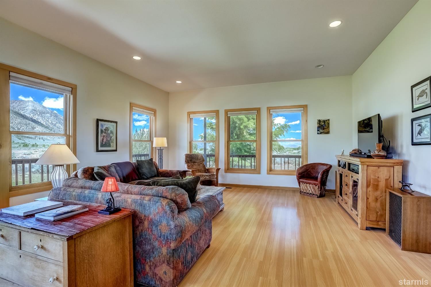 604 River Ranch Road Woodfords, CA 96120 - Photo 10 of 25 a living room with furniture and a flat screen tv
