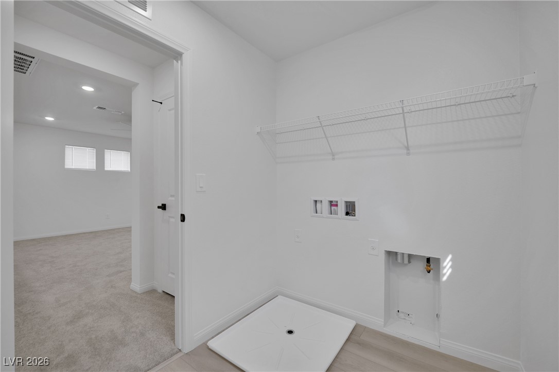 9136 Rivington Avenue Las Vegas, NV 89148 - Photo 29 of 43 Washroom with hookup for a washing machine, recessed lighting, and gas dryer hookup