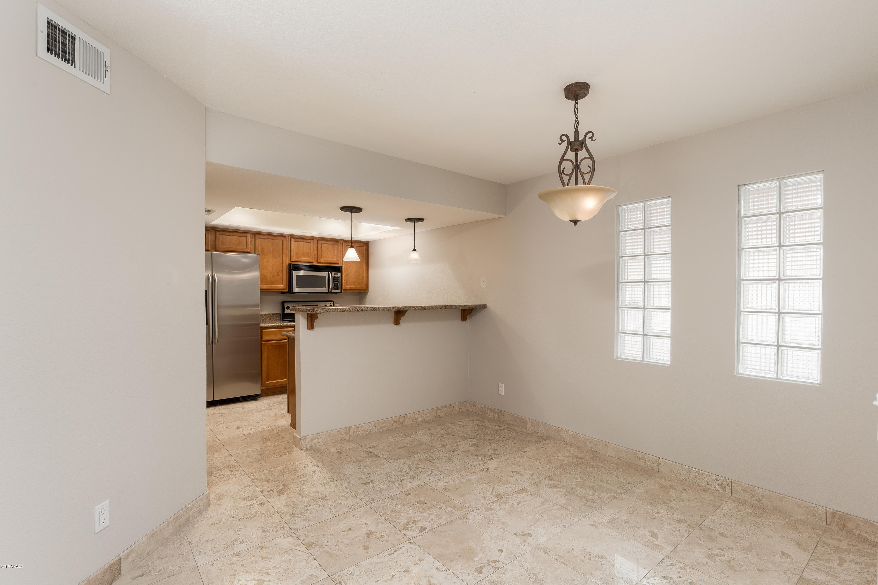 3235 East Camelback Road, Unit 114 Phoenix, AZ 85018 - Photo 8 of 15 003_Dining