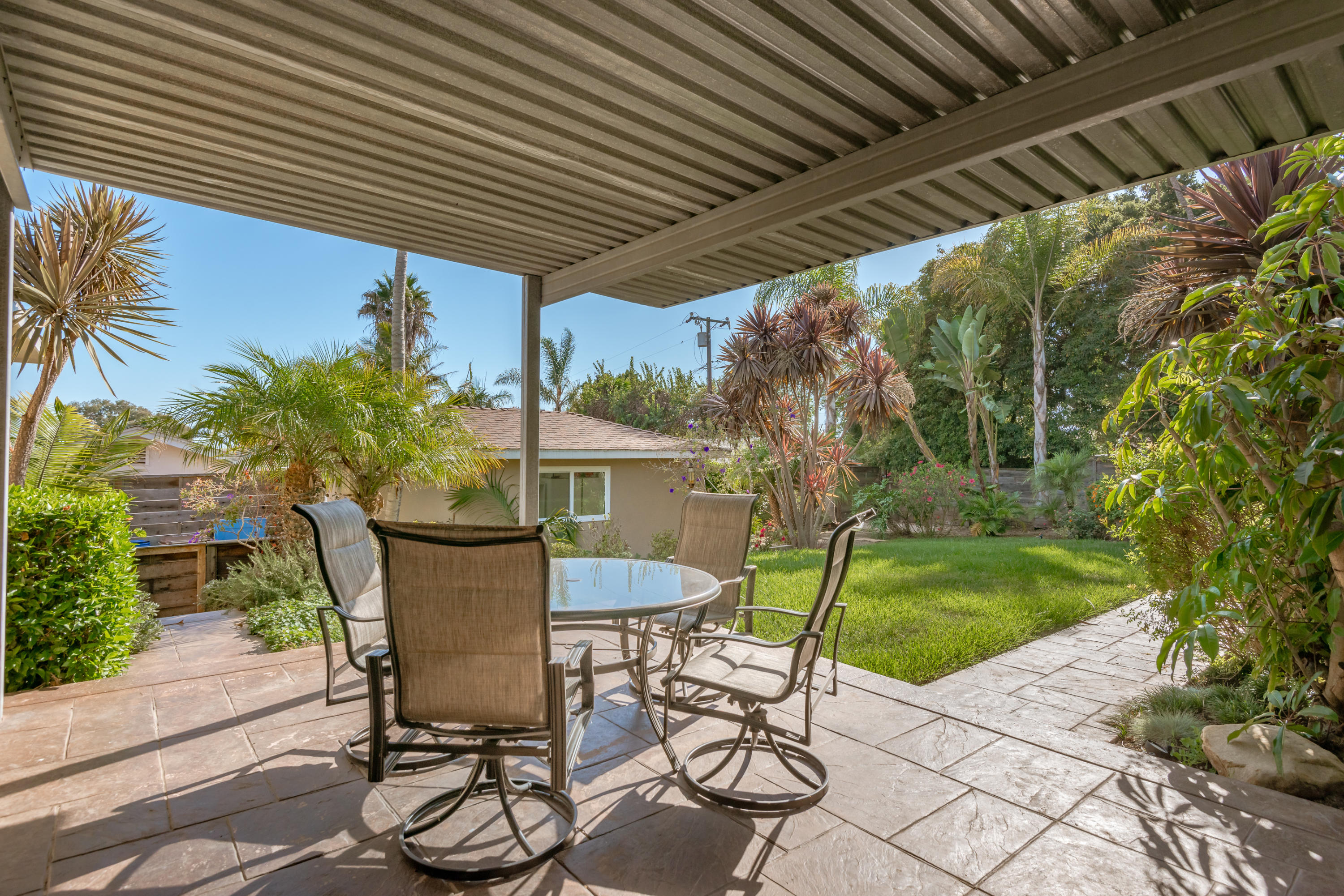 429 Terrace Road Santa Barbara, CA 93109 - Photo 11 of 15 a view of a patio with table and chairs and potted plants
