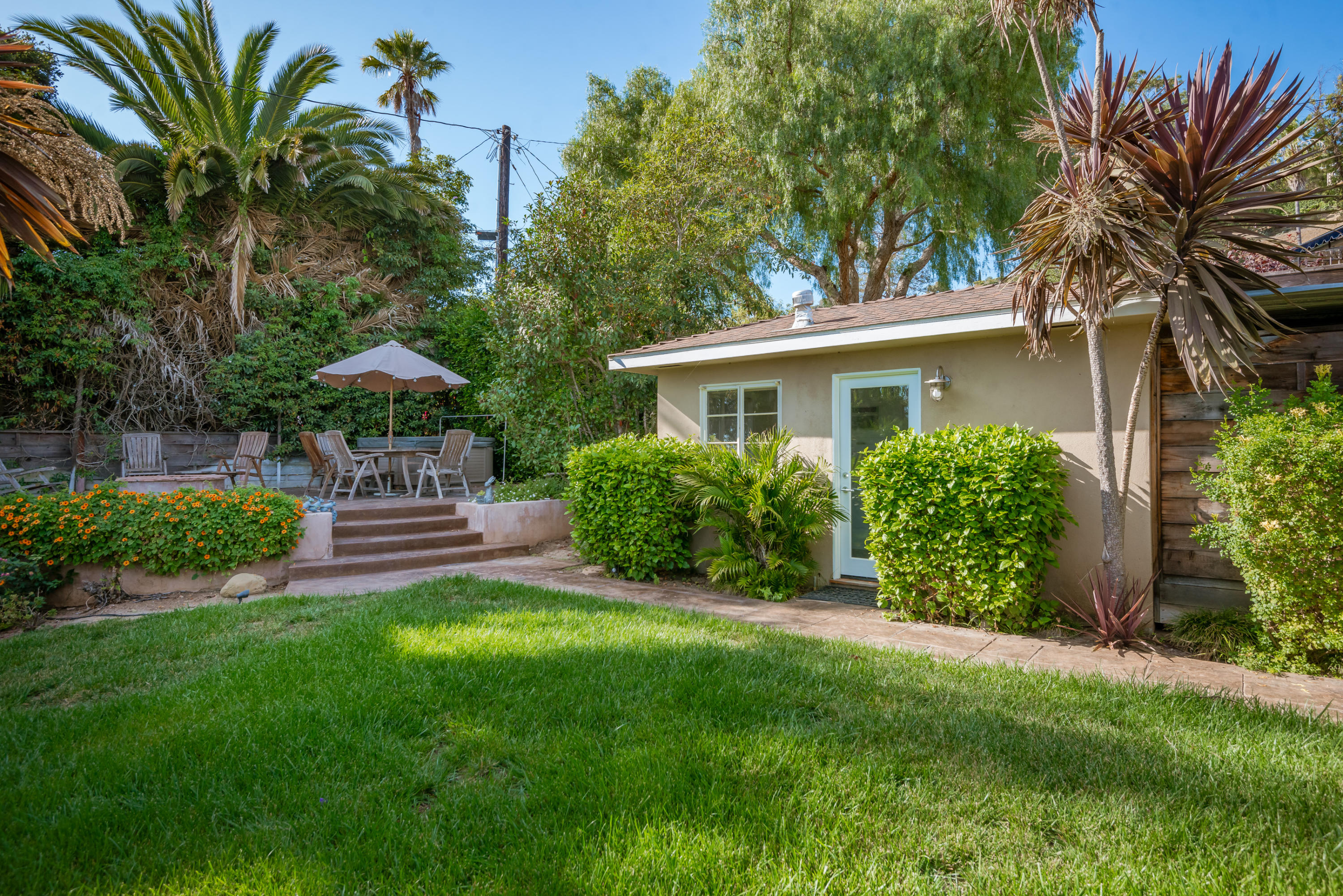 429 Terrace Road Santa Barbara, CA 93109 - Photo 12 of 15 a view of a house with a yard and sitting area