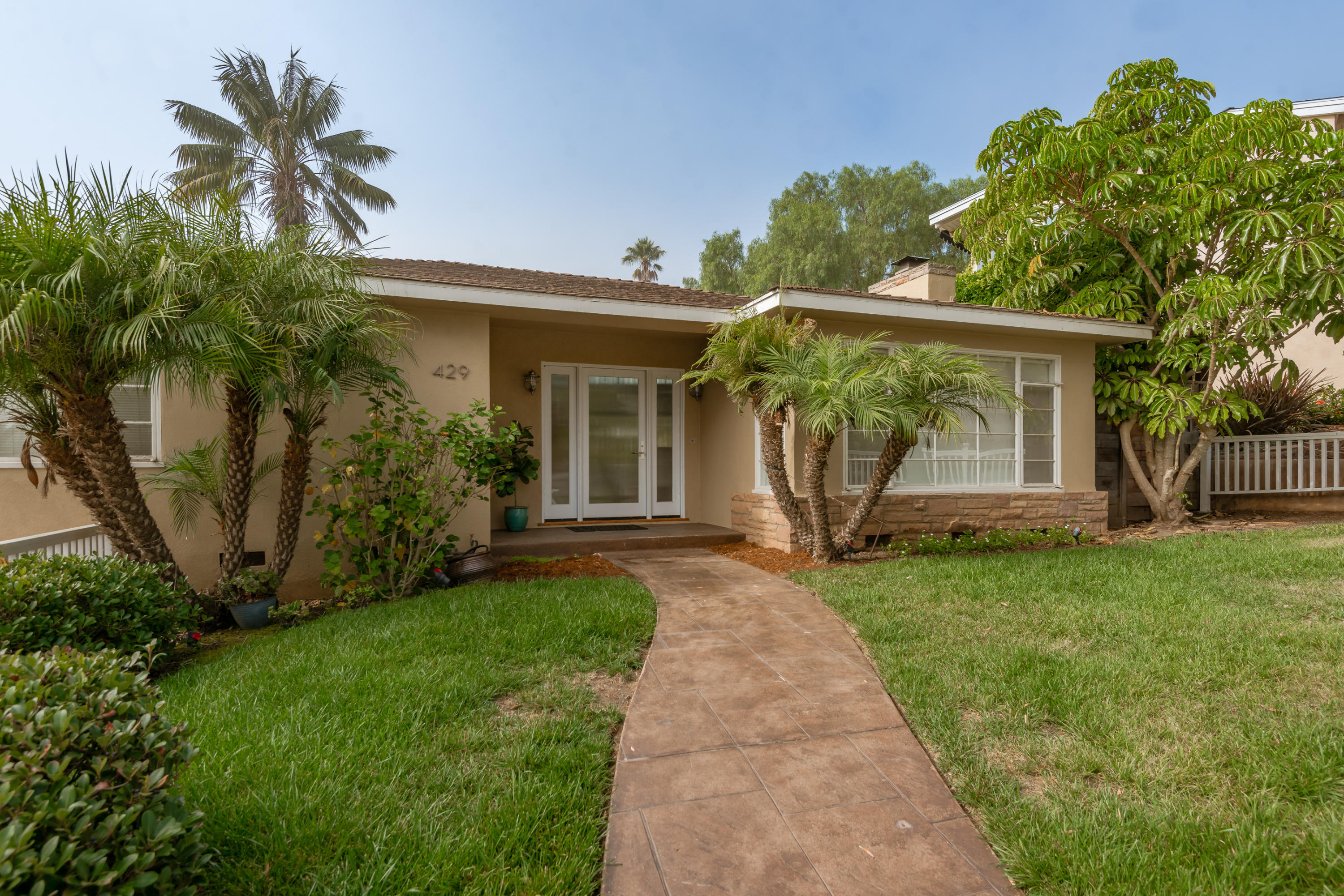 429 Terrace Road Santa Barbara, CA 93109 - Photo 2 of 15 a front view of a house with garden