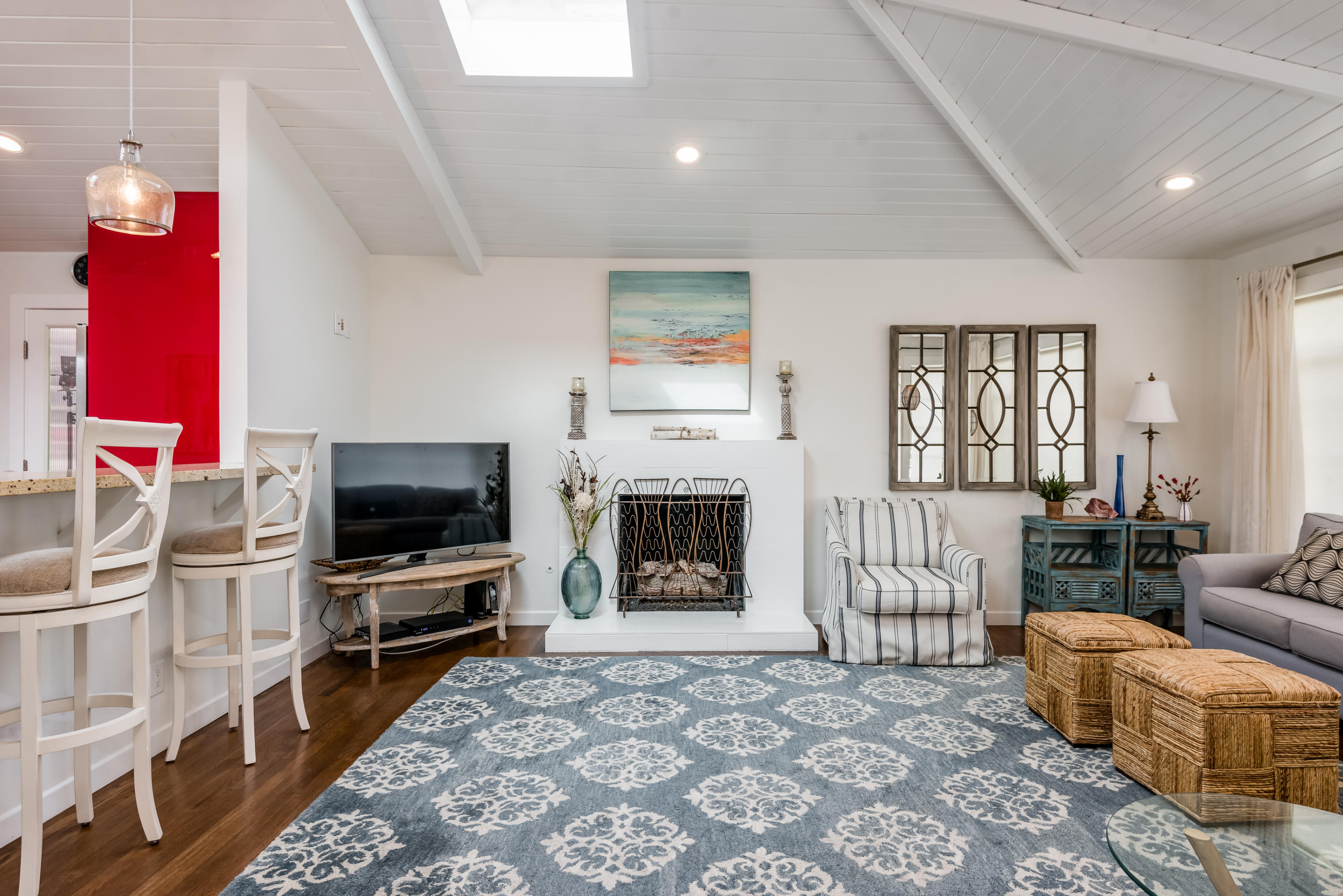 429 Terrace Road Santa Barbara, CA 93109 - Photo 4 of 15 a living room with furniture a flat screen tv and a fireplace