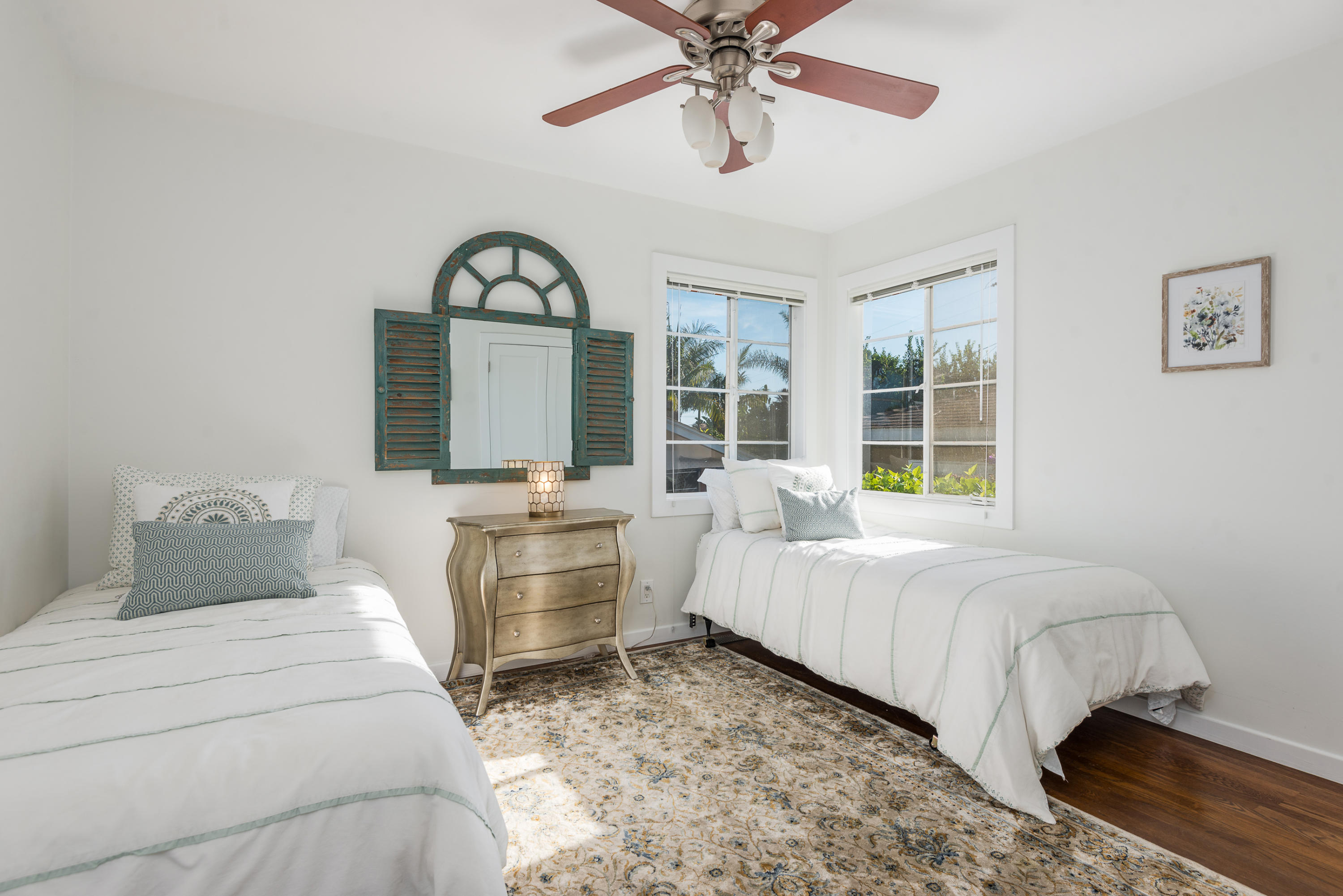 429 Terrace Road Santa Barbara, CA 93109 - Photo 10 of 15 a bed room with a bed and a chandelier