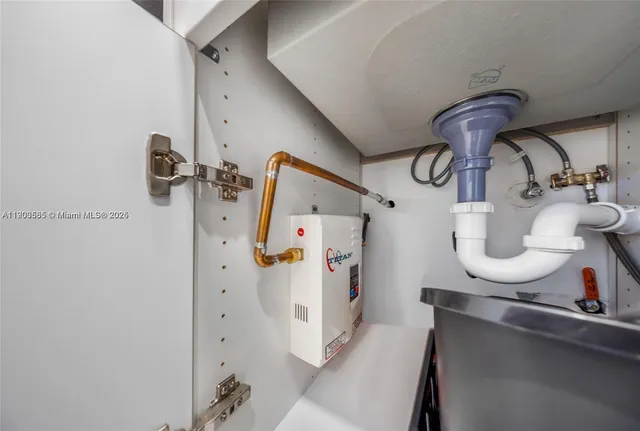 a view of kitchen and dining room with wooden floor