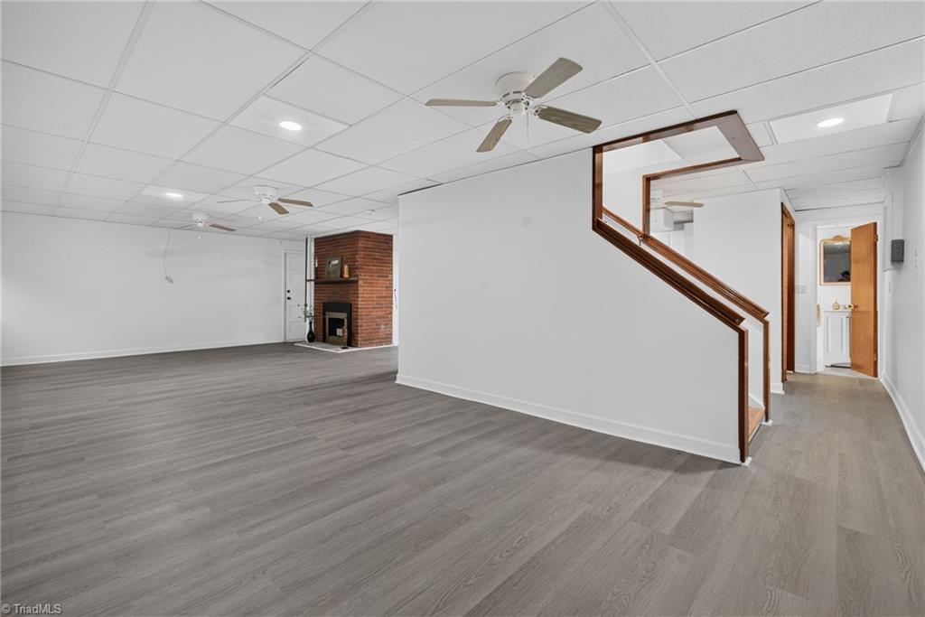 113 Green Valley Road Greensboro, NC 27403 - Photo 35 of 46 The finished basement offers exceptional flexibility for entertaining, hobbies, fitness, or creating the space you've always wanted.