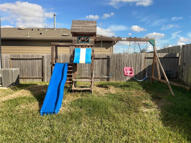 a view of a backyard of a house