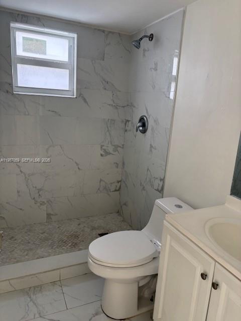828 Southwest 20th Avenue, Unit 1 Miami, FL 33135 - Photo 6 of 10 a bathroom with a toilet sink and shower