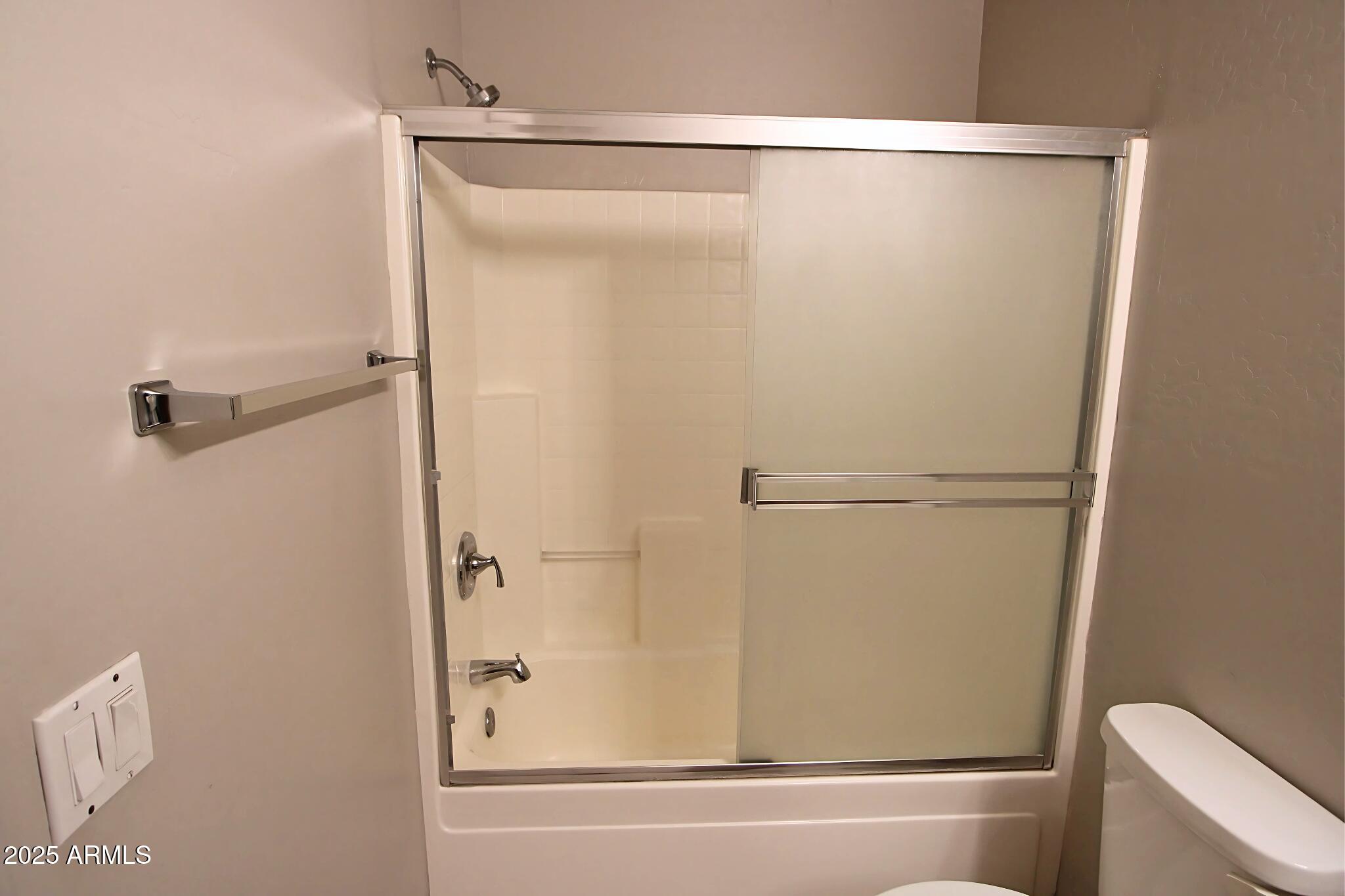13211 South Kin Circle, Unit C Arizona City, AZ 85123 - Photo 11 of 17 a bathroom with a shower