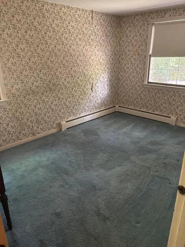 an empty room with a window