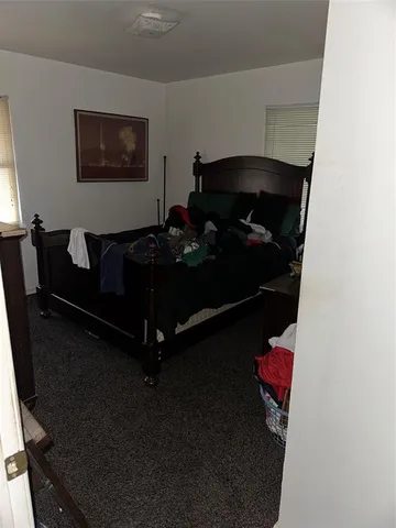 a view of outdoor space with deck and trees