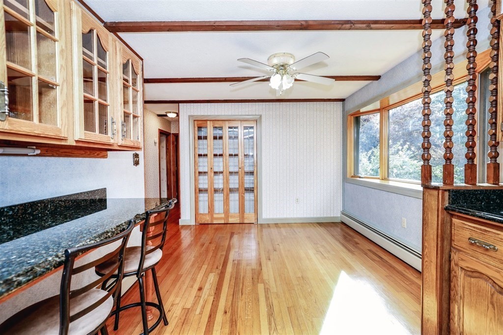 120 Chadwick Road Haverhill, MA 01835 - Photo 13 of 29 a view of an empty room with wooden floor and a window