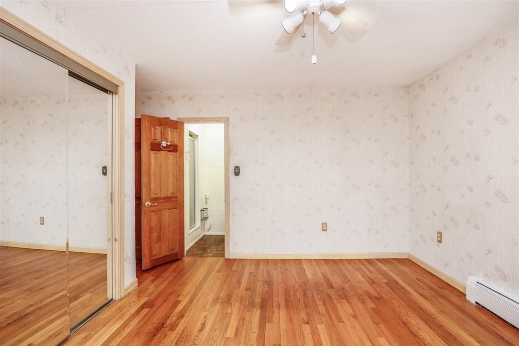 120 Chadwick Road Haverhill, MA 01835 - Photo 16 of 29 a view of a room with wooden floor and a window