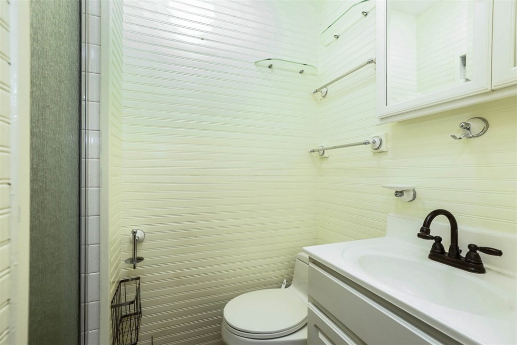 120 Chadwick Road Haverhill, MA 01835 - Photo 18 of 29 a bathroom with a sink toilet and vanity