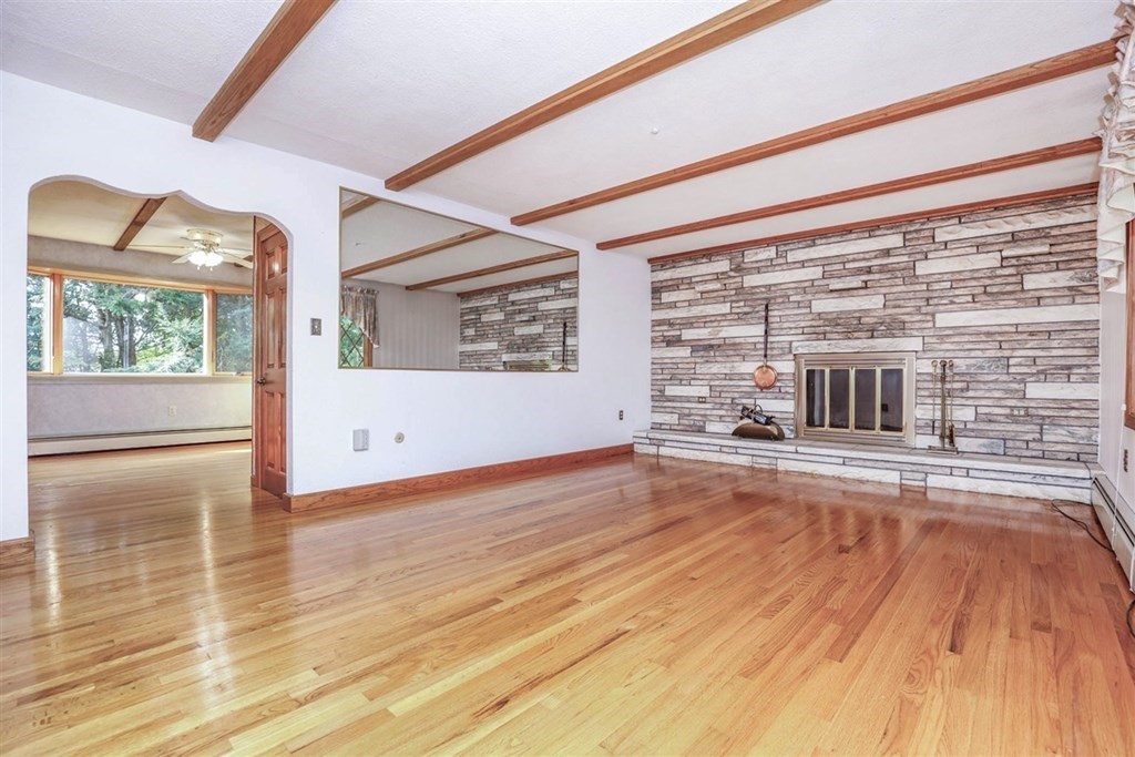 120 Chadwick Road Haverhill, MA 01835 - Photo 6 of 29 a view of empty room with wooden floor and fan