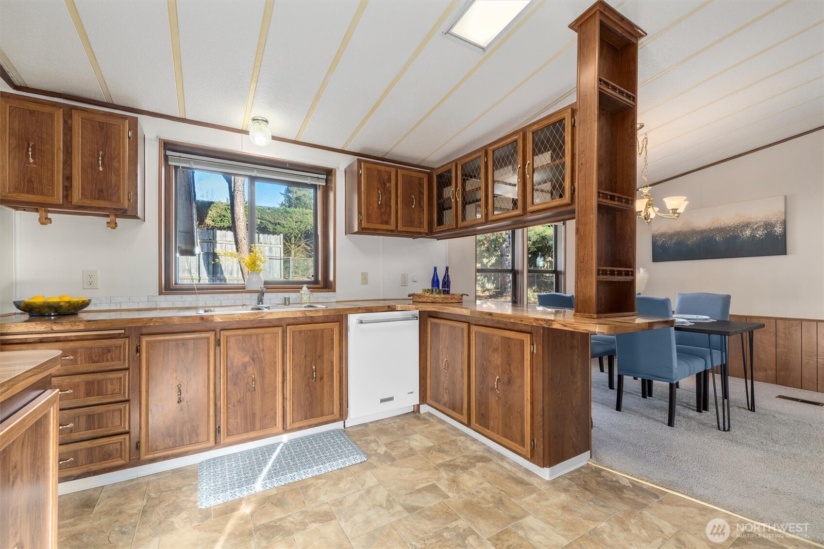 24331 S Park Bothell, WA 98021 - Photo 15 of 40 a kitchen with stainless steel appliances granite countertop a stove a sink and a microwave