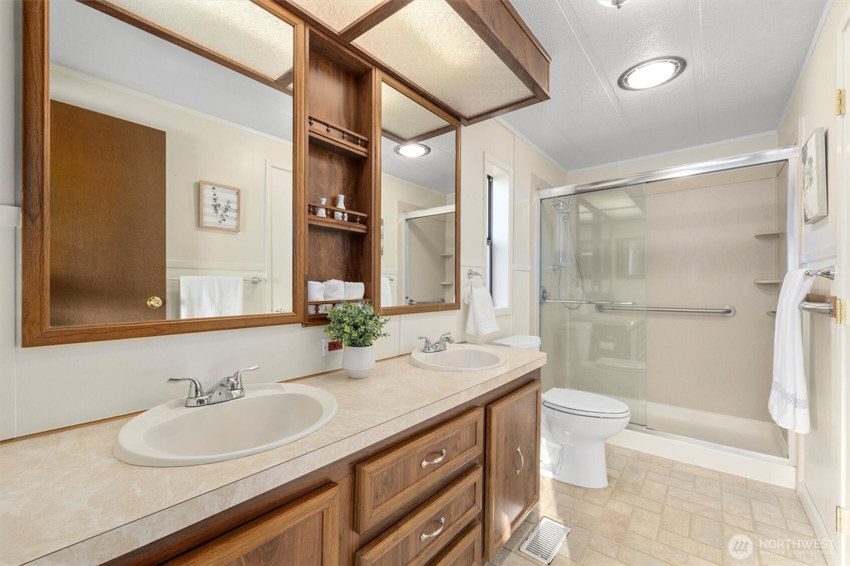 24331 S Park Bothell, WA 98021 - Photo 21 of 40 a bathroom with a sink a toilet and shower