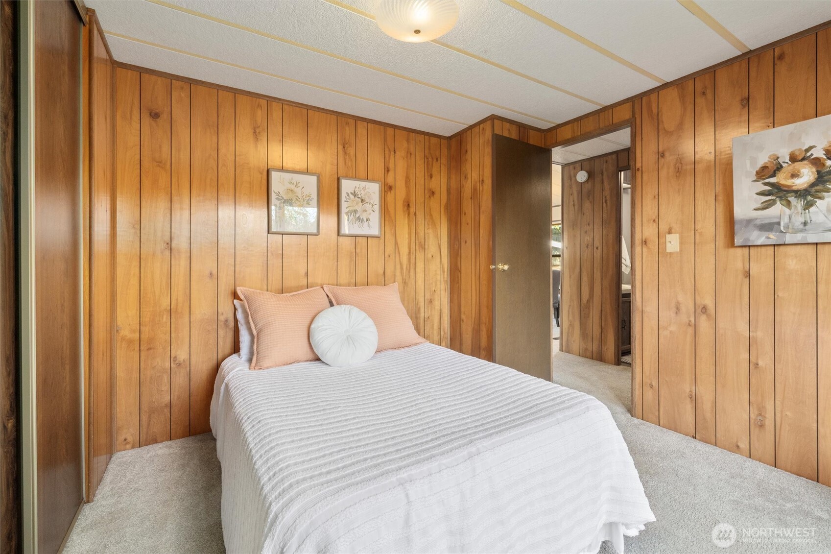 24331 S Park Bothell, WA 98021 - Photo 22 of 40 a bedroom with a bed and a mirror