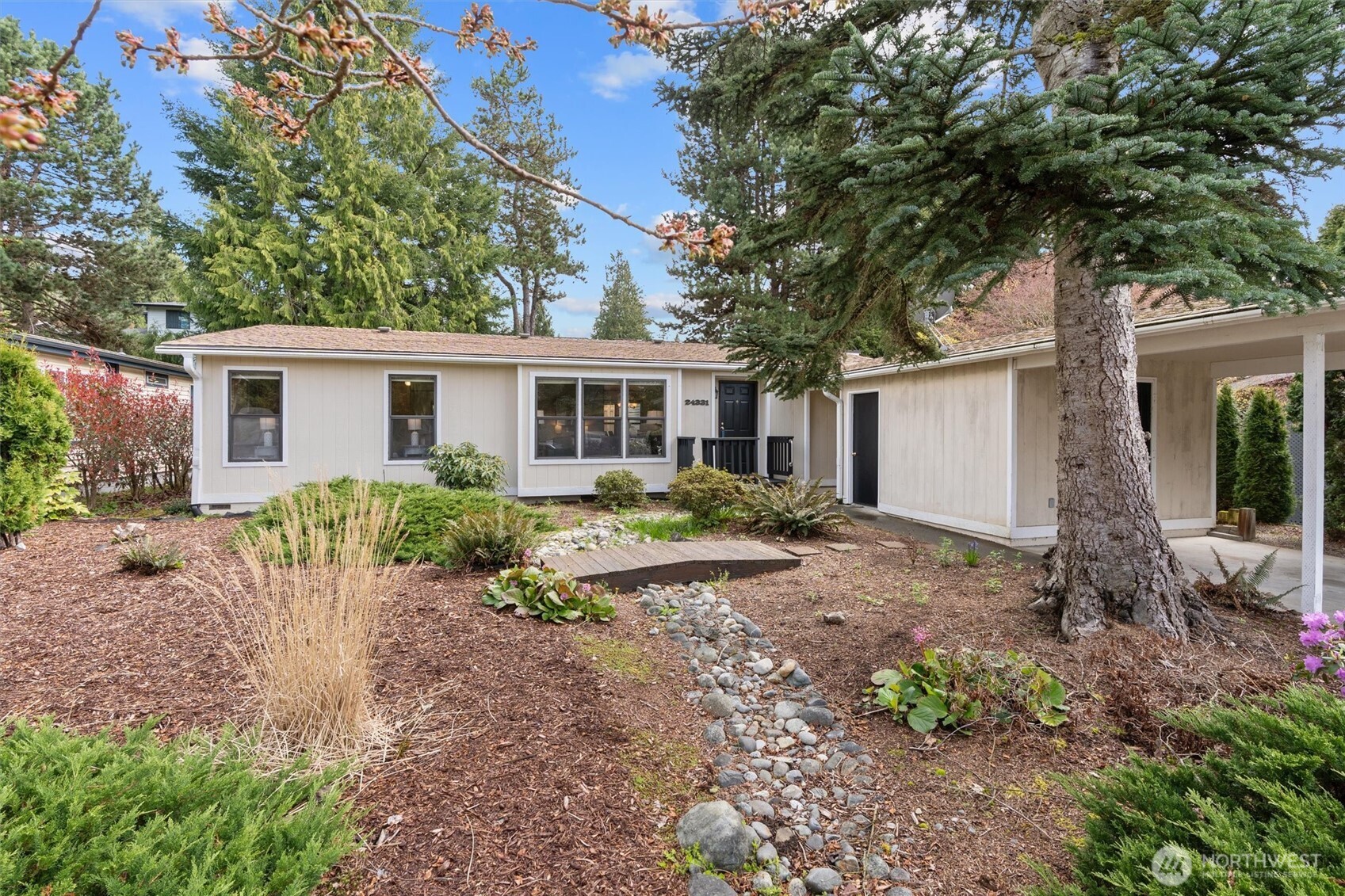 24331 S Park Bothell, WA 98021 - Photo 4 of 40 a view of a house with a yard and large tree