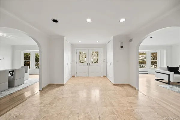 a view of an empty room and a gallery
