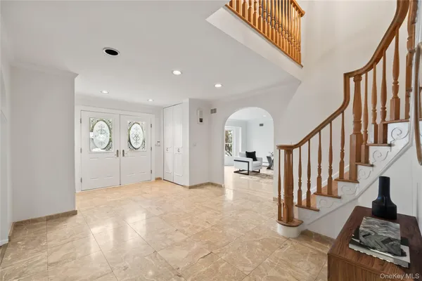 a view of an entryway with stairs