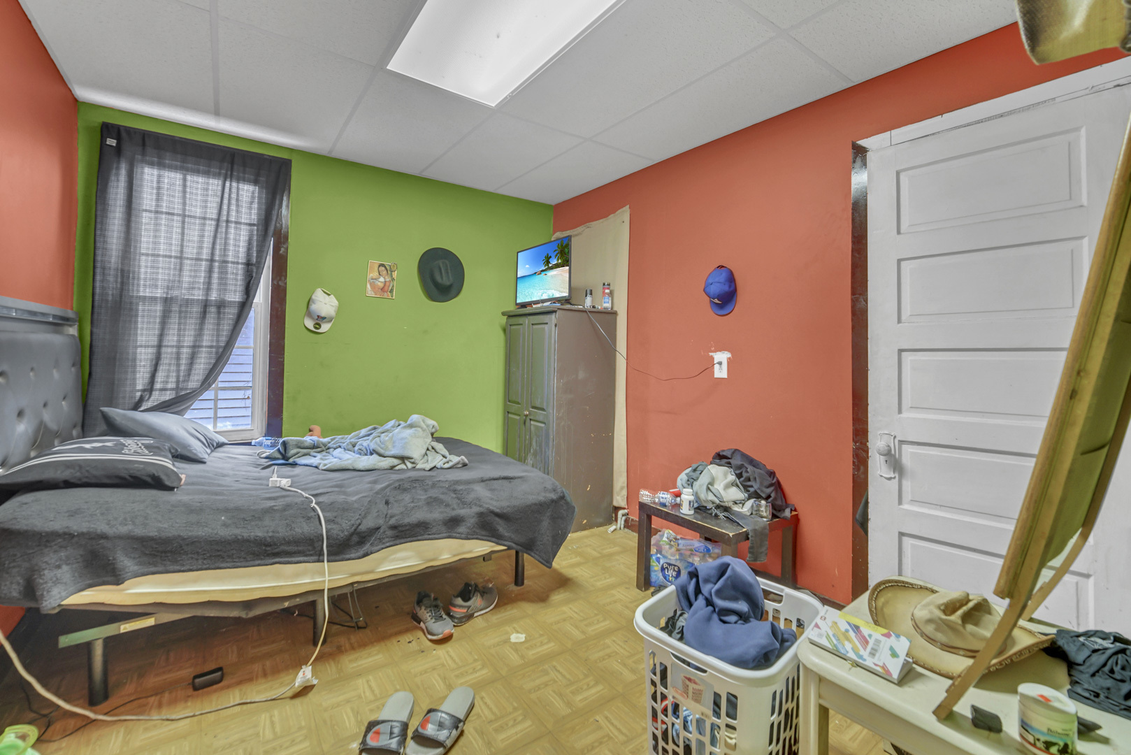 720 Meeker Avenue Joliet, IL 60432 - Photo 15 of 20 a bedroom with a bed and a mirror