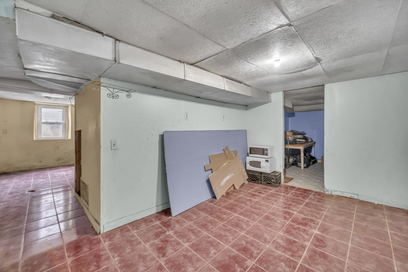 720 Meeker Avenue Joliet, IL 60432 - Photo 19 of 20 a bedroom with a bed and a chandelier