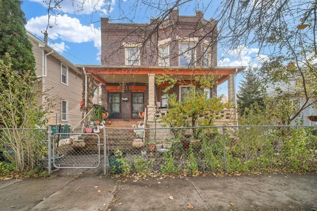 a view of a pathway with a patio