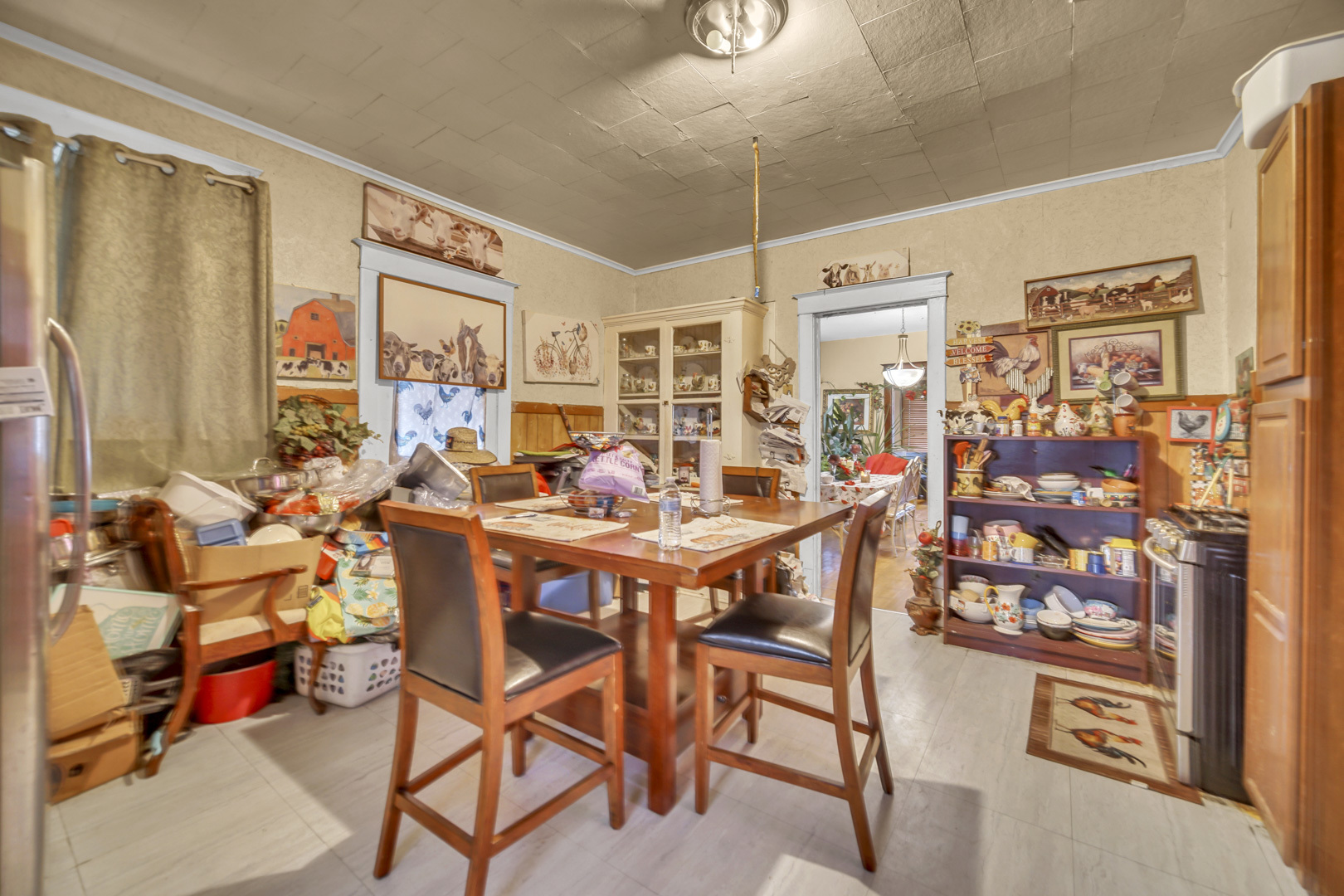 720 Meeker Avenue Joliet, IL 60432 - Photo 10 of 20 a view of a dining room with furniture and chandelier