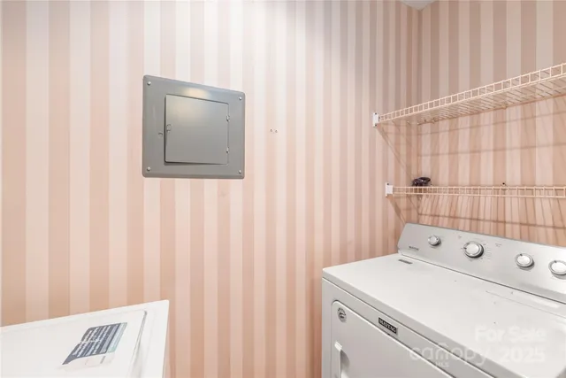 a view of a bathroom with a sink and a window