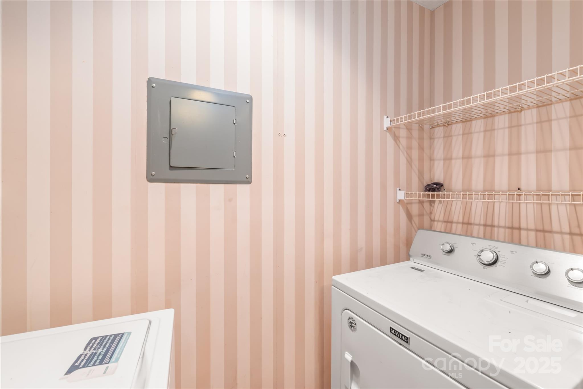 1612 Sharon Road West, Unit 70 Charlotte, NC 28210 - Photo 16 of 18 a view of a bathroom with a sink and a window