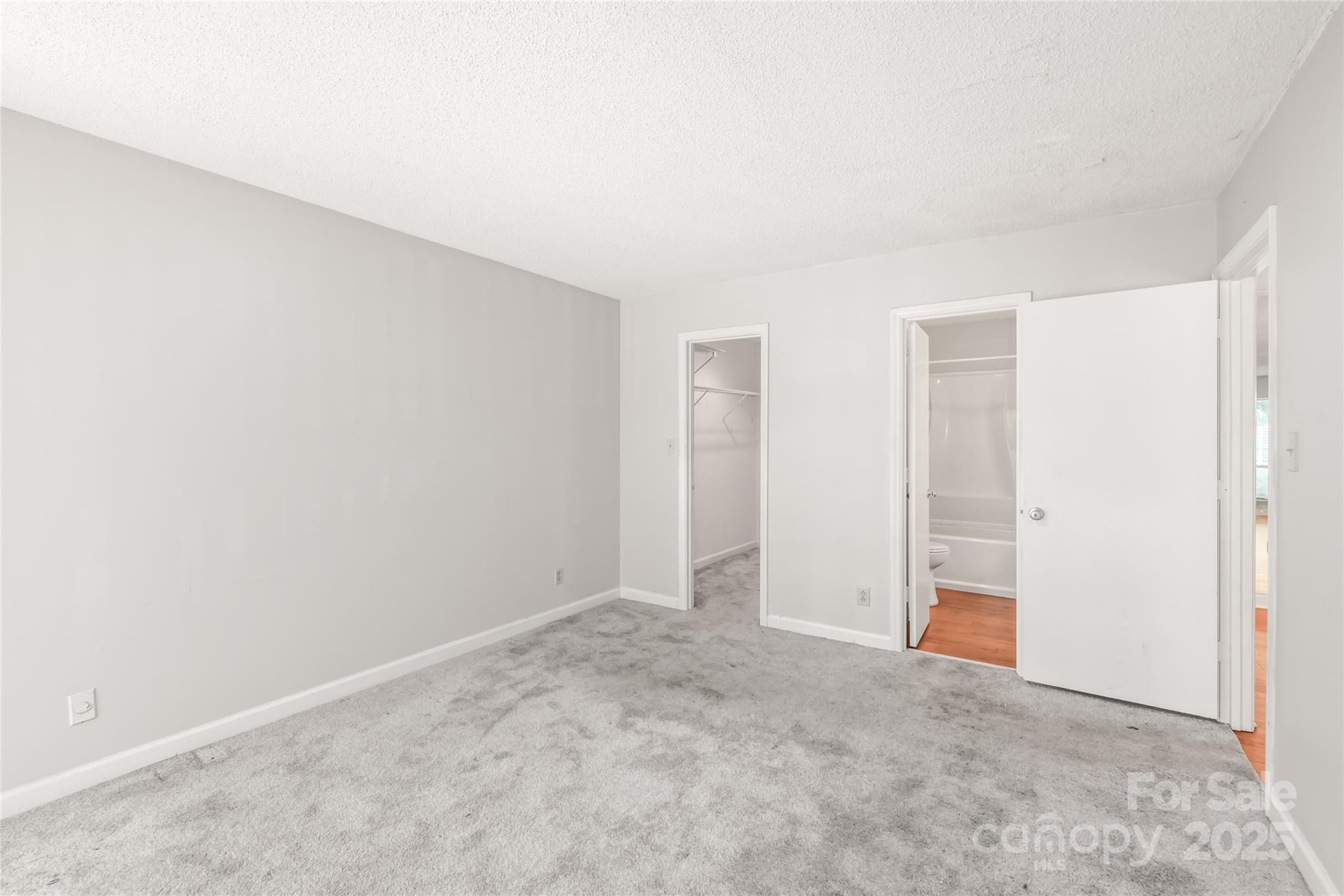 1612 Sharon Road West, Unit 70 Charlotte, NC 28210 - Photo 7 of 18 a view of an empty room
