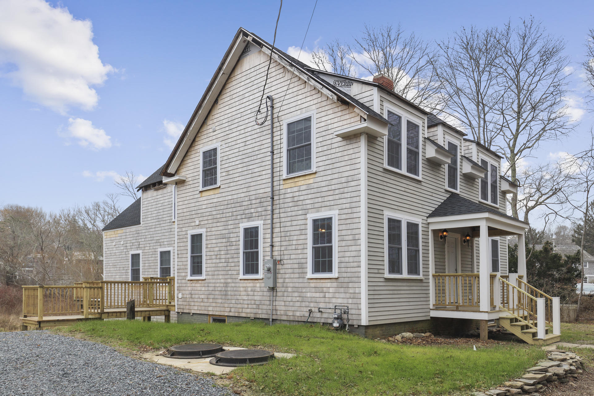 119 Tupper Road Sandwich, MA 02563 - Photo 1 of 32 a front view of a house with a garden