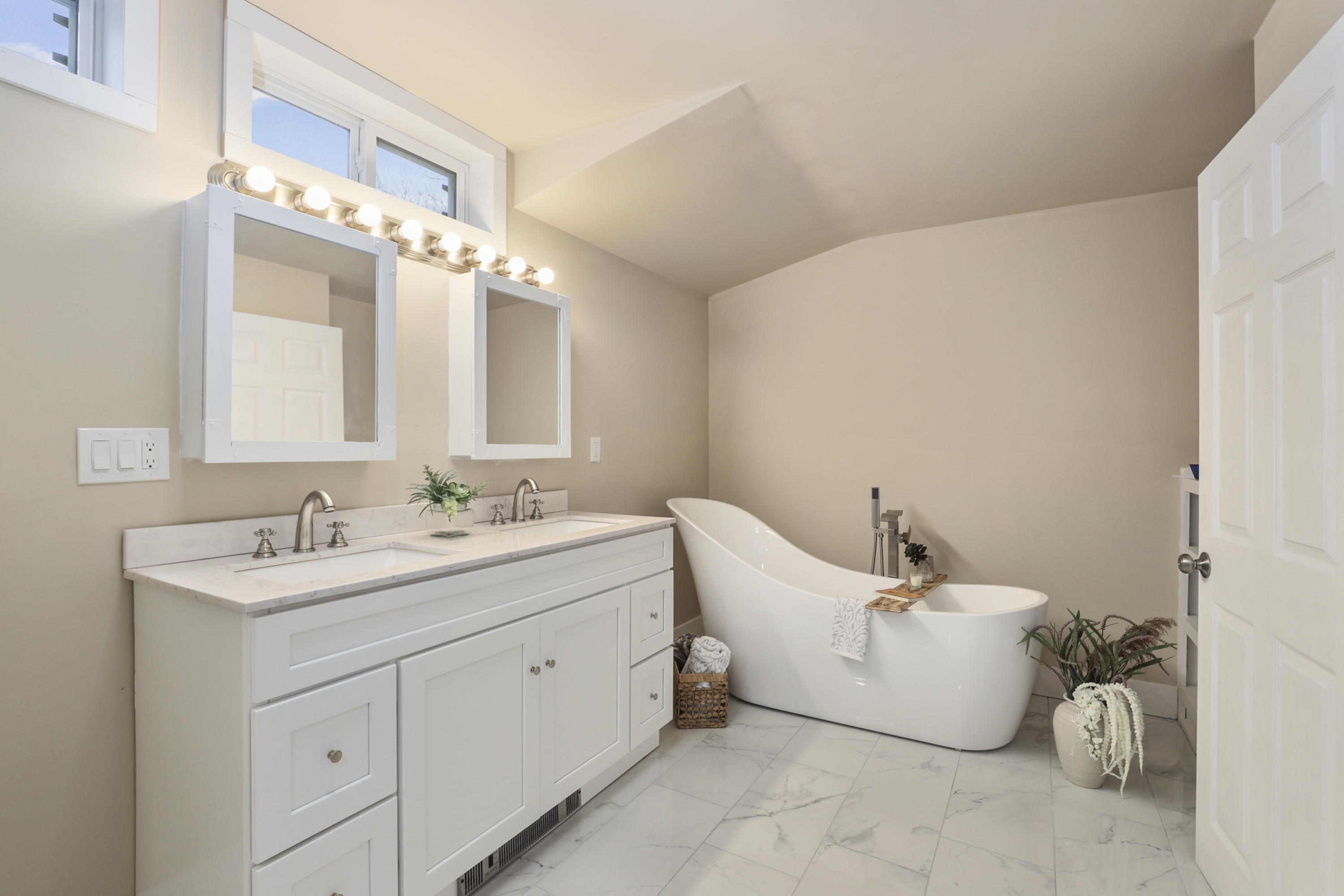 119 Tupper Road Sandwich, MA 02563 - Photo 11 of 32 a en suite bathroom with a double vanity sink and a mirror