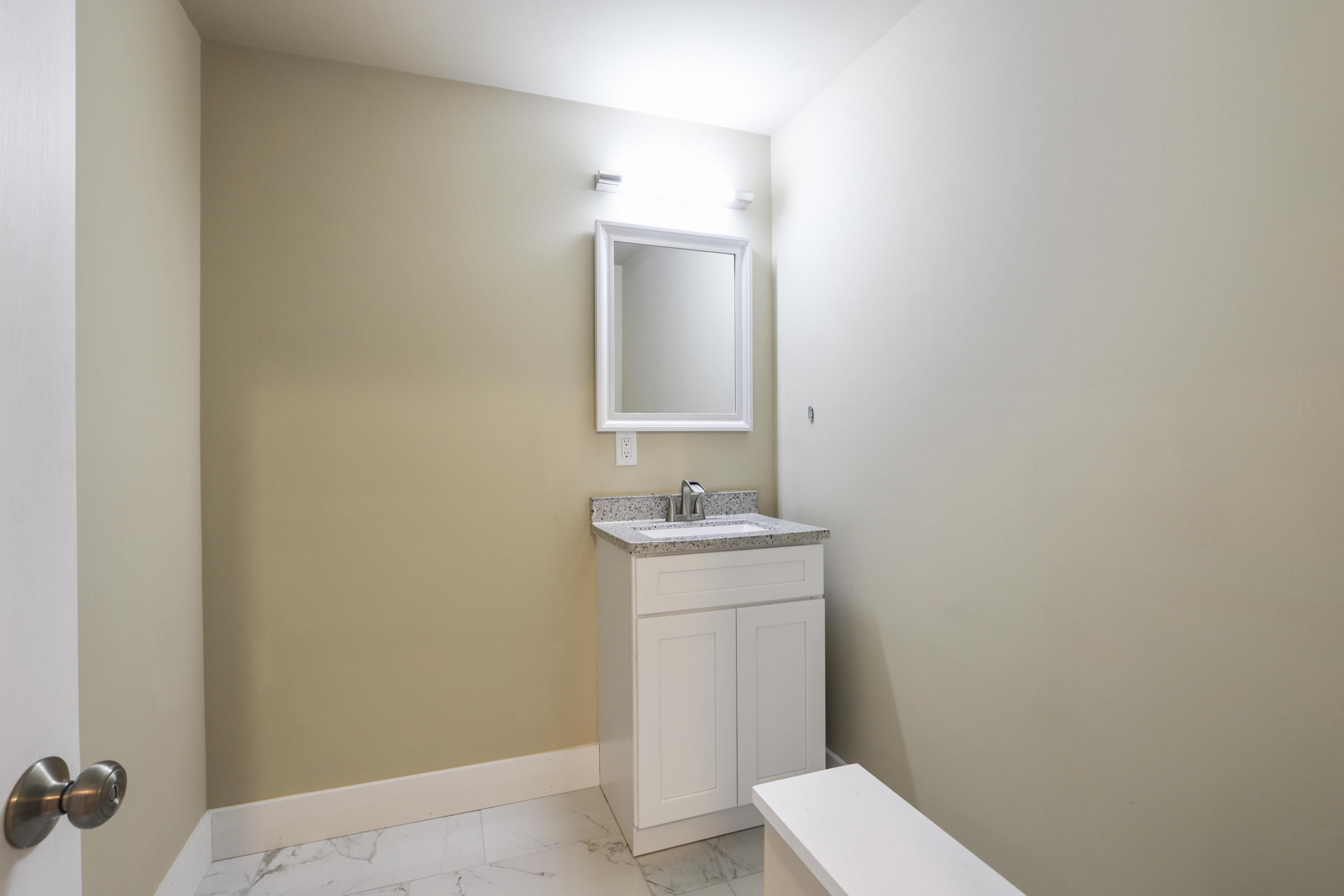 119 Tupper Road Sandwich, MA 02563 - Photo 15 of 32 a bathroom with a sink toilet and mirror