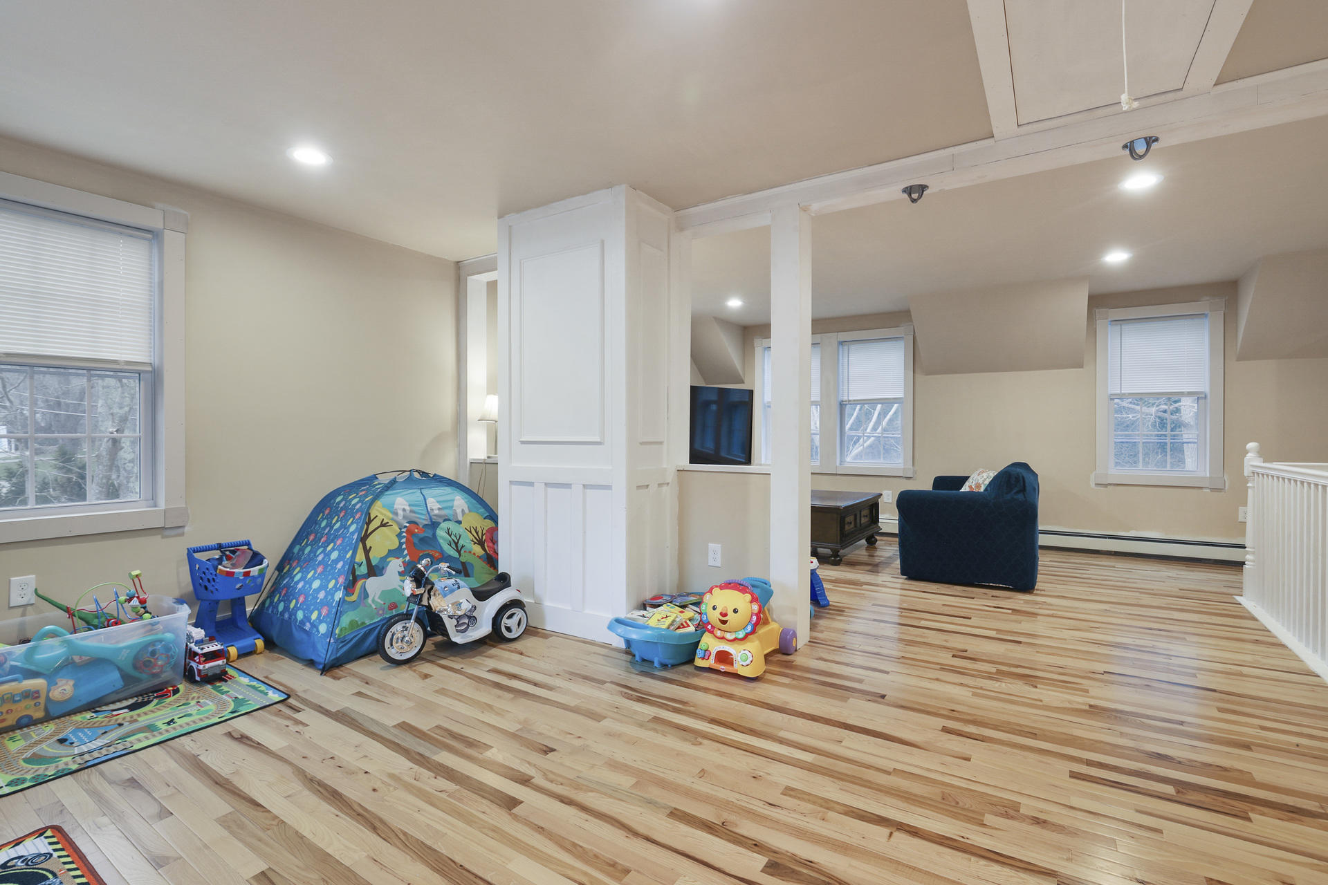 119 Tupper Road Sandwich, MA 02563 - Photo 17 of 32 a bedroom with furniture and a wooden floor