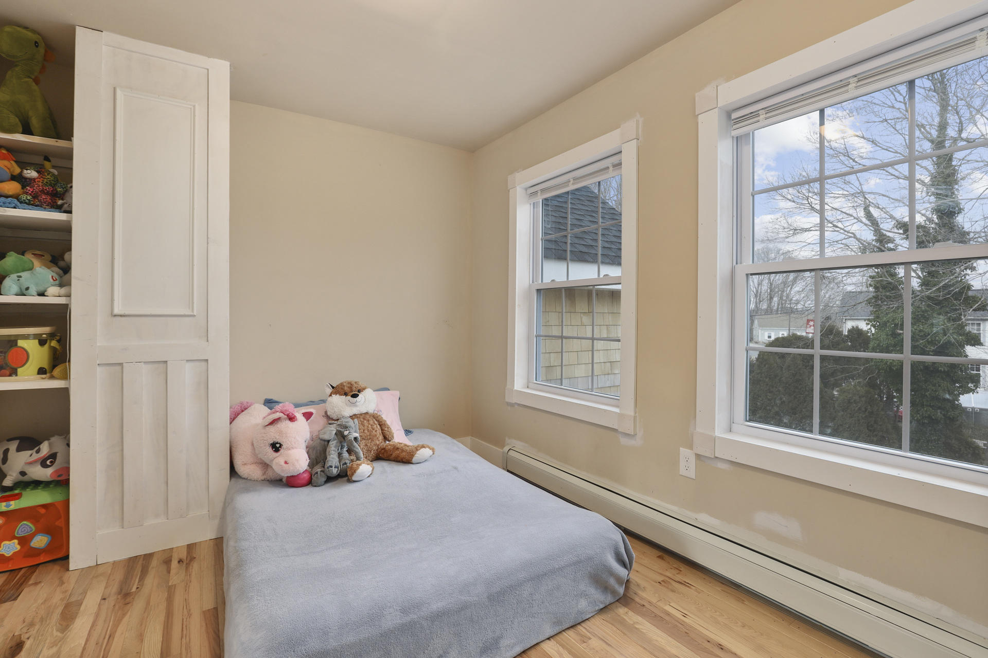 119 Tupper Road Sandwich, MA 02563 - Photo 19 of 32 a bedroom with a bed and a window