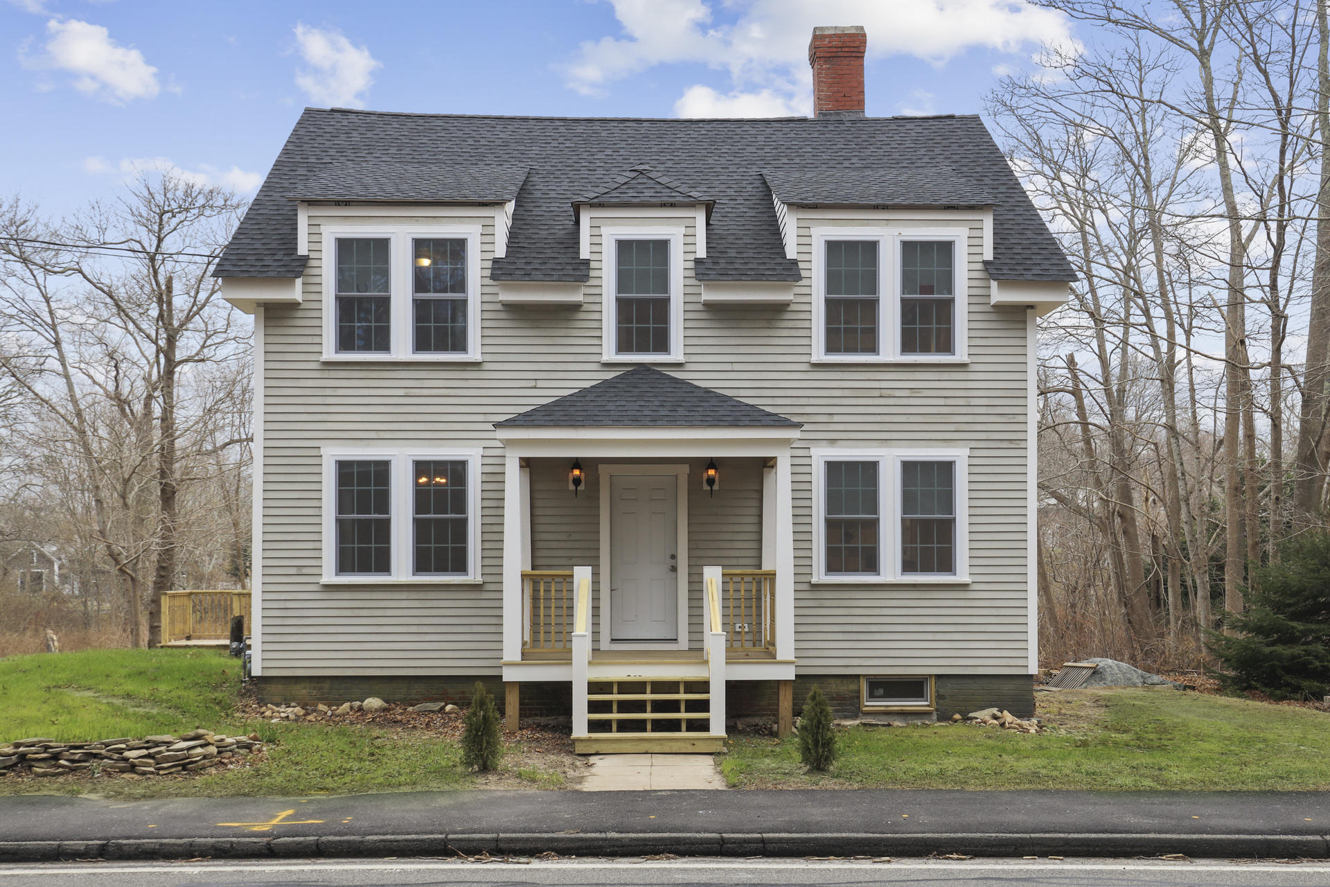 119 Tupper Road Sandwich, MA 02563 - Photo 2 of 32 a front view of a house