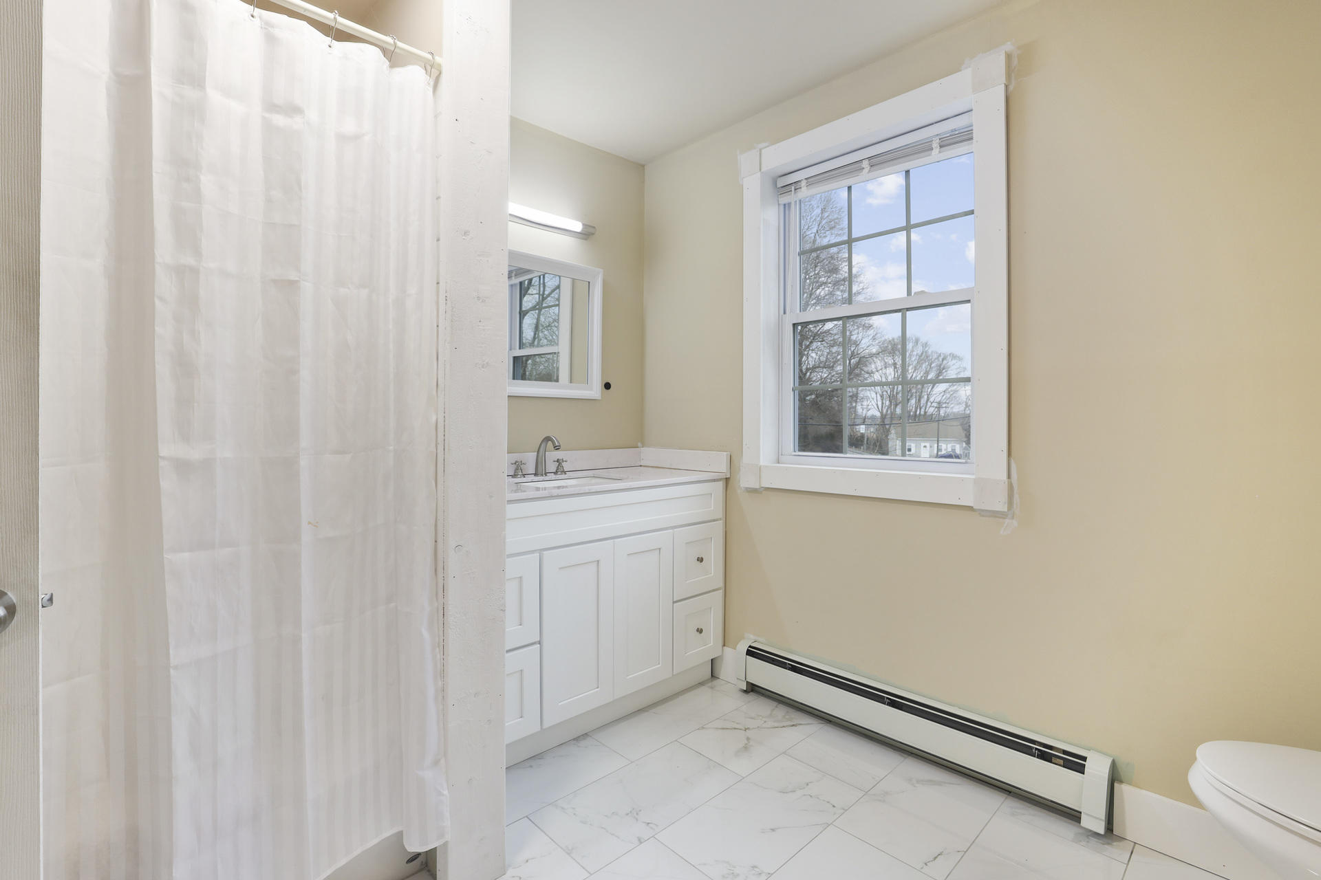 119 Tupper Road Sandwich, MA 02563 - Photo 21 of 32 a bathroom with a sink toilet and shower