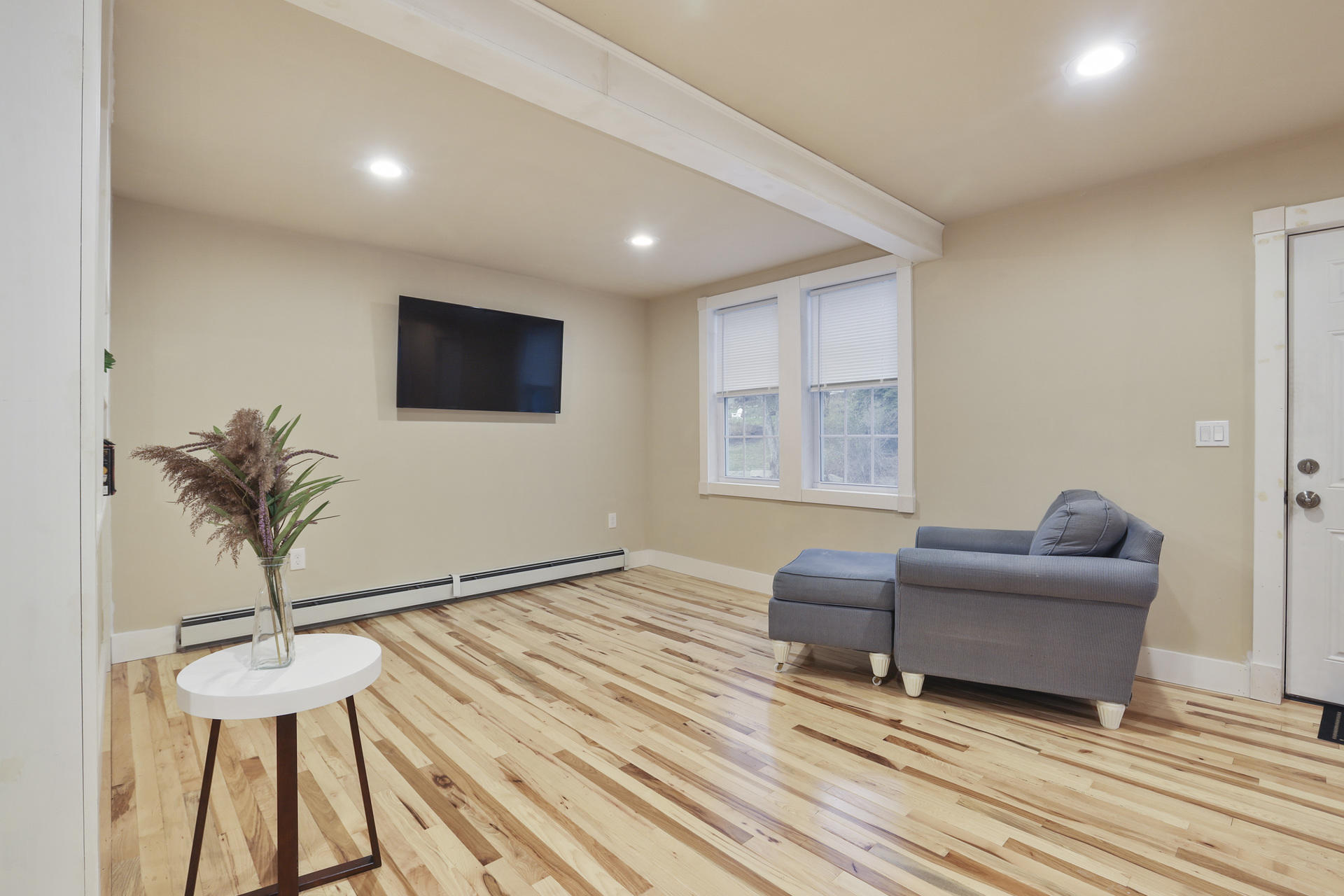 119 Tupper Road Sandwich, MA 02563 - Photo 3 of 32 a living room with furniture and a flat screen tv