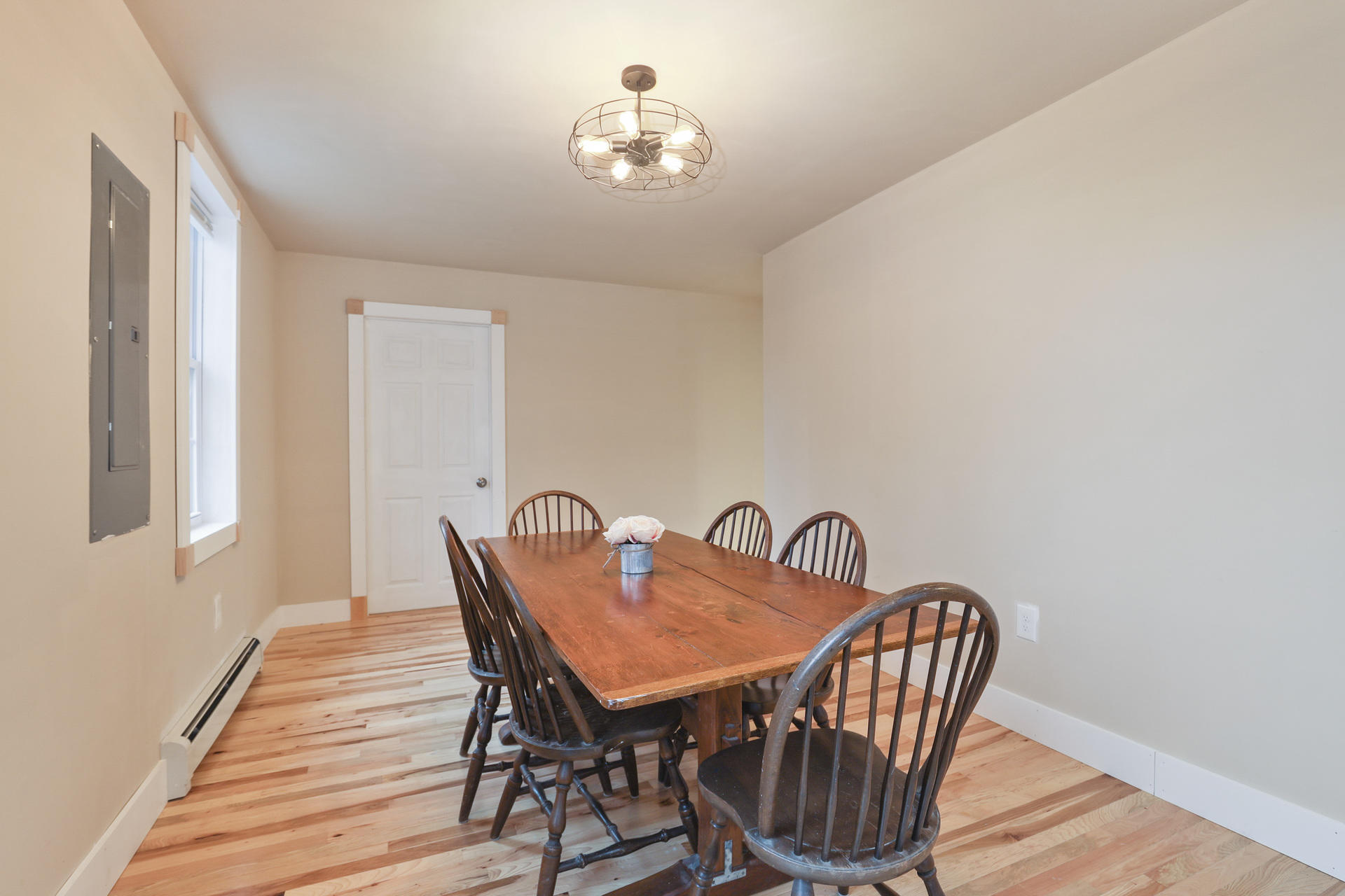 119 Tupper Road Sandwich, MA 02563 - Photo 6 of 32 a view of a dining room with furniture and wooden floor