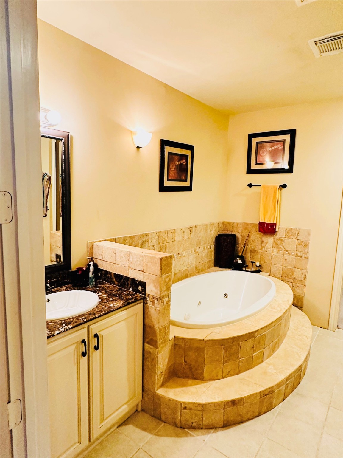 6324 Fairdale Lane, Unit 3007 Houston, TX 77057 - Photo 11 of 24 a bathroom with a sink and a mirror