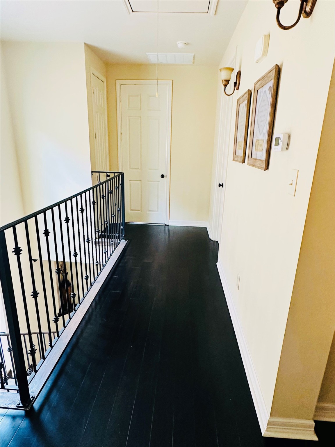 6324 Fairdale Lane, Unit 3007 Houston, TX 77057 - Photo 14 of 24 a view of a hallway with wooden floor