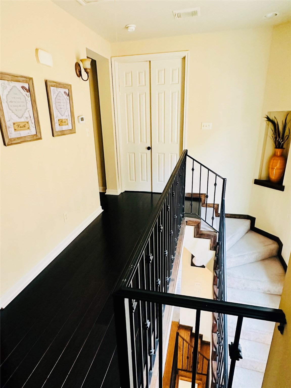 6324 Fairdale Lane, Unit 3007 Houston, TX 77057 - Photo 15 of 24 a view of entryway and hall with wooden floor