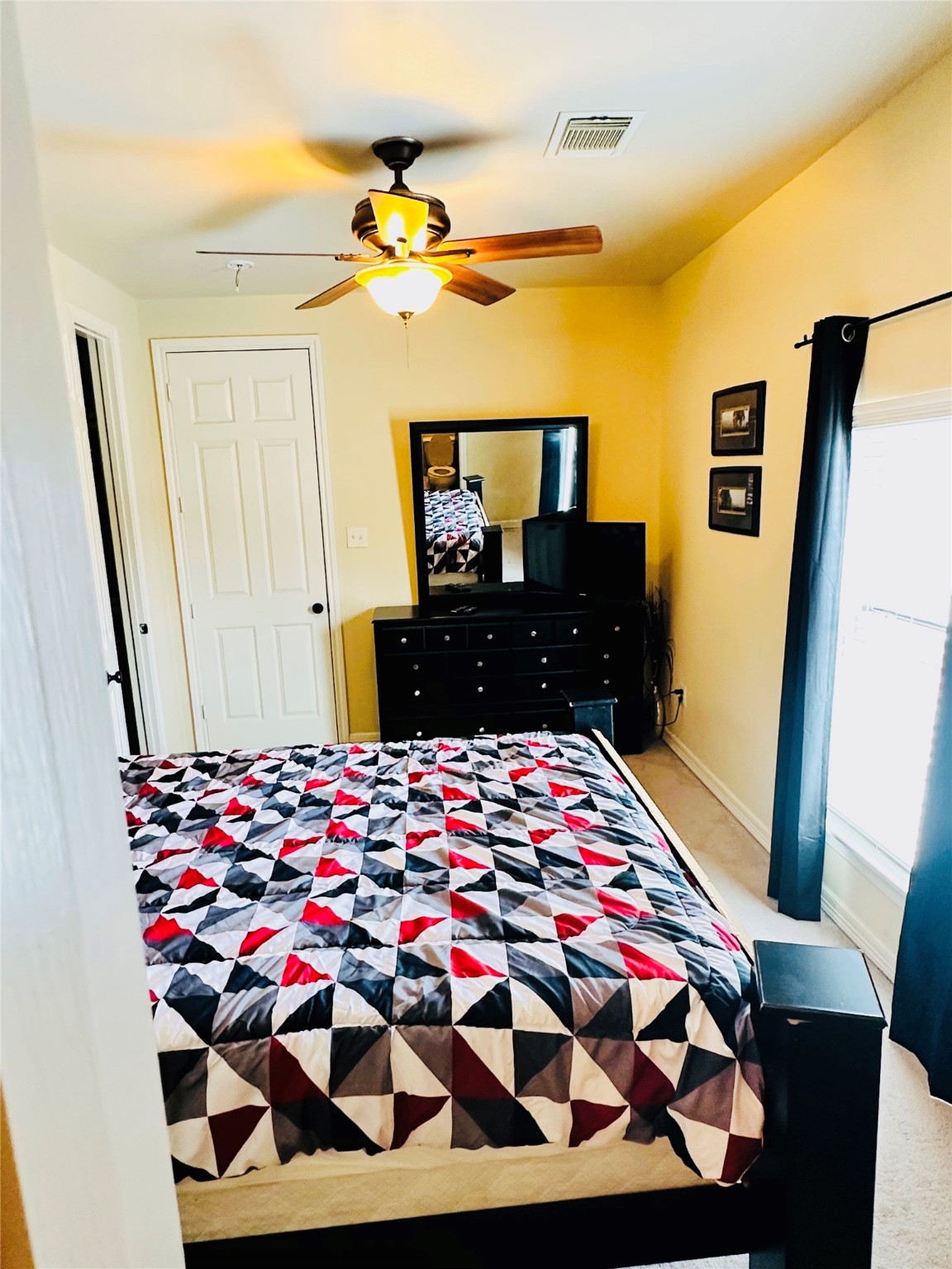 6324 Fairdale Lane, Unit 3007 Houston, TX 77057 - Photo 16 of 24 a bedroom with a bed and wooden floor