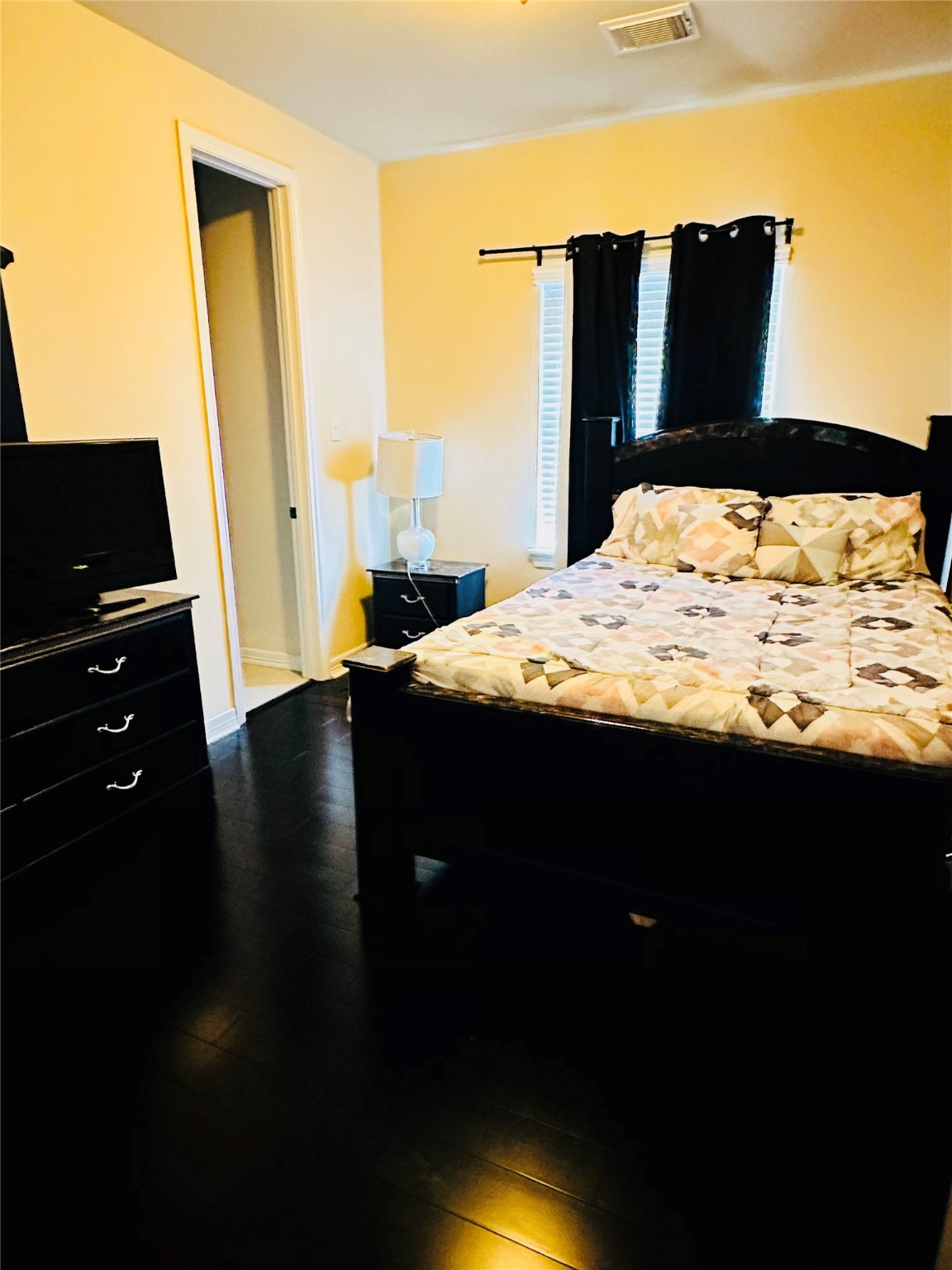 6324 Fairdale Lane, Unit 3007 Houston, TX 77057 - Photo 17 of 24 a bed sitting in a bedroom next to a yard