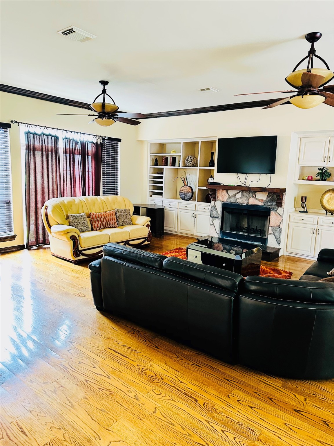 6324 Fairdale Lane, Unit 3007 Houston, TX 77057 - Photo 3 of 24 a living room with fireplace furniture and a flat screen tv