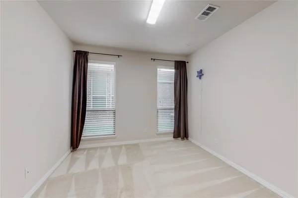 an empty room with closet