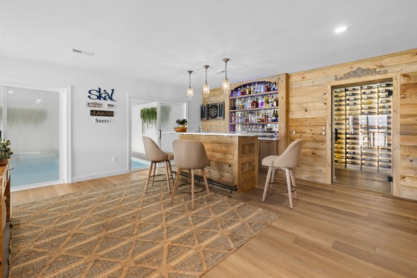 516 Hillandale Road Seneca, SC 29672 - Photo 26 of 50 This inviting space features a well-appointed bar, hardwood floors, and a dedicated wine cellar.