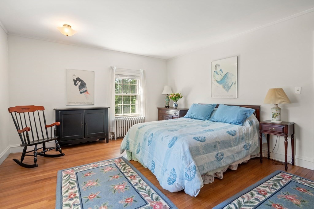 63 Bonad Road Newton, MA 02465 - Photo 11 of 15 a bedroom with a bed chair and window